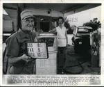 1974 Press Photo Leo Cooper & Wife Display Old Gas Prices Station In Ok. Fixed Price $24.99.