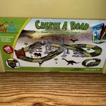 Dinosaur World Race Track Set Road-building Adventure W/ Toy Cars & Figures. Fixed Price $24.99.