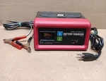Cen-tech 6/12 Volt Automatic Battery Charger Item 60322. Fixed Price $55.00.